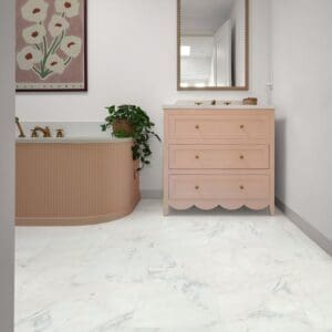 Bellagio marble pvt701 installed in modern bathroom with pink cabinetry
