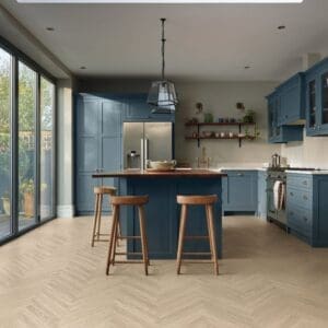 Dolce prime flooring installed in modern kitchen with blue cabinets