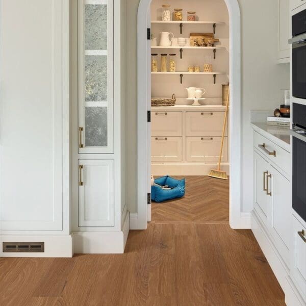 Bologna oak luxury vinyl flooring installed in kitchen and pantry area