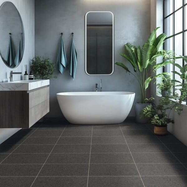 Modern bathroom featuring procida limestone vinyl tiles with freestanding bath