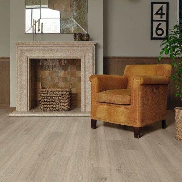 Elba oak pvp410 flooring in fireplace area with orange armchair