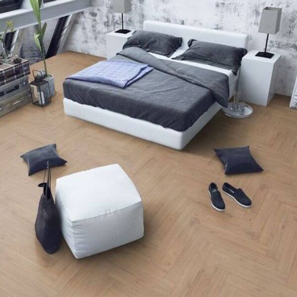 Lignum fusion premium oregon oak herringbone flooring in contemporary bedroom with white and grey decor