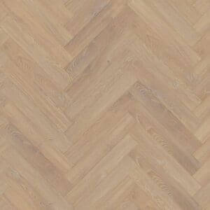 Lignum fusion premium desert oak herringbone flooring sample showing warm beige tones in herringbone pattern
