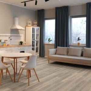 Greige oak laminate flooring in open plan kitchen and living area with beige sofa