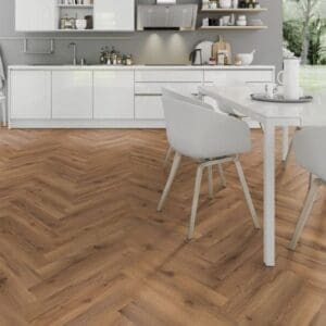 White kitchen with dining area and lignum fusion premium robust fumed oak herringbone flooring