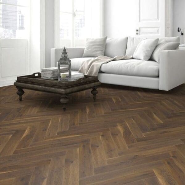 Cozy living room with fireplace and coffee oak herringbone laminate flooring
