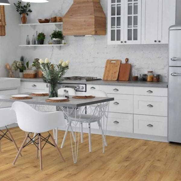 Natural oak laminate flooring in white kitchen with dining table and wooden accents