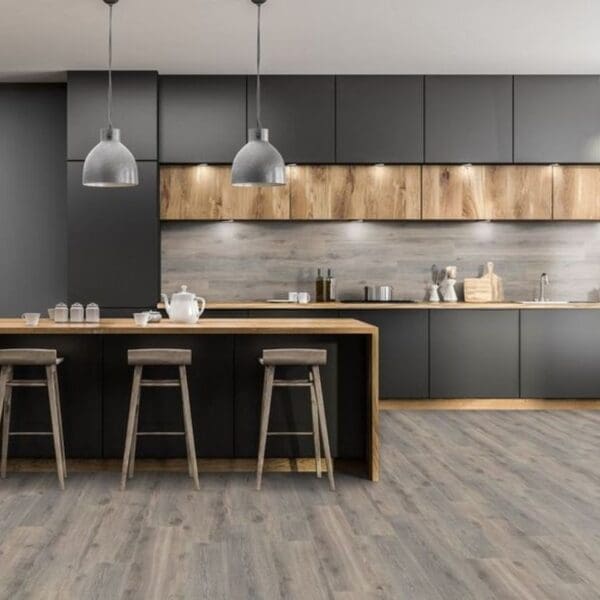 Contemporary kitchen with dark cabinets and volcanic oak laminate flooring