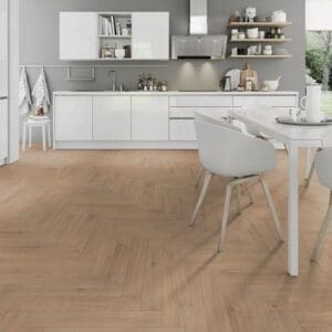 Lignum fusion premium oregon oak herringbone flooring in white modern kitchen with dining area