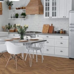 White kitchen with lignum fusion premium robust fumed oak herringbone flooring and dining area