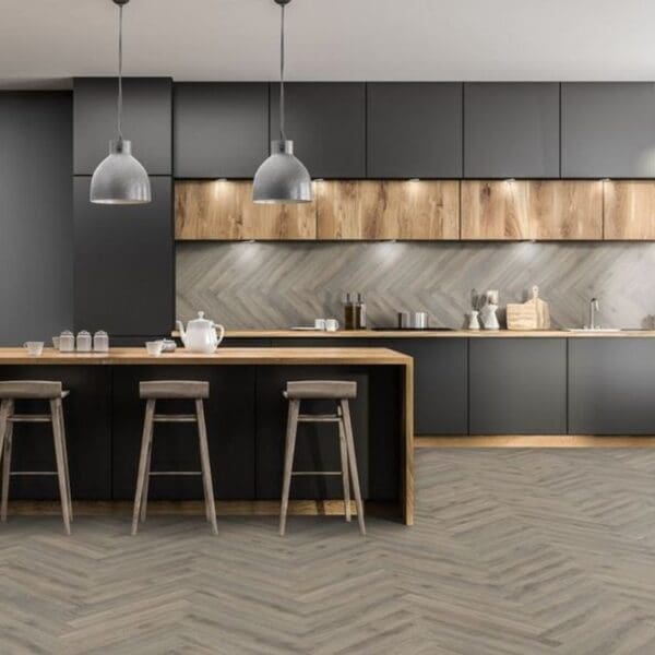 Contemporary kitchen with dark cabinets and volcanic oak herringbone flooring