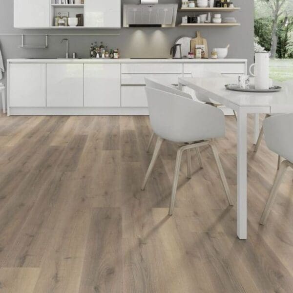 Greige oak laminate flooring in scandinavian style living room with blue sofa and ceramic stove