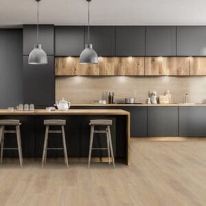 Desert oak laminate flooring in contemporary kitchen with black cabinets and wood accents