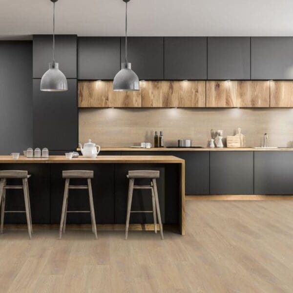 Desert oak laminate flooring in contemporary kitchen with black cabinets and wood accents