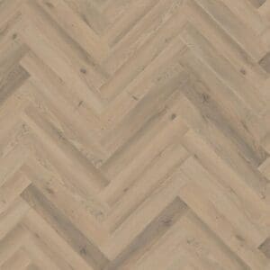Lignum fusion premium greige oak herringbone laminate flooring close-up showing herringbone pattern