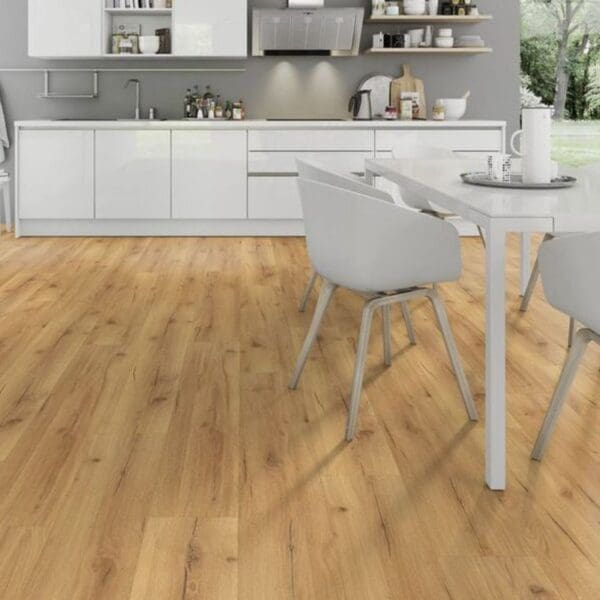 Natural oak laminate flooring in white kitchen with dining area and minimalist design