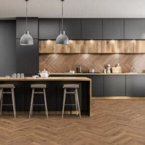 Modern kitchen with black cabinets and lignum fusion premium robust fumed oak herringbone flooring