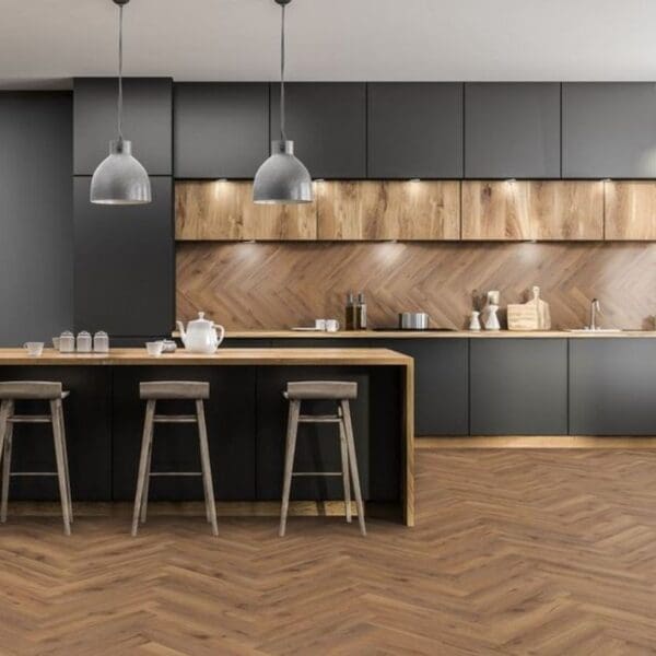 Modern kitchen with black cabinets and lignum fusion premium robust fumed oak herringbone flooring