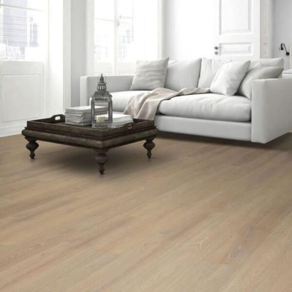 Desert oak laminate flooring in scandinavian style living room with blue sofa