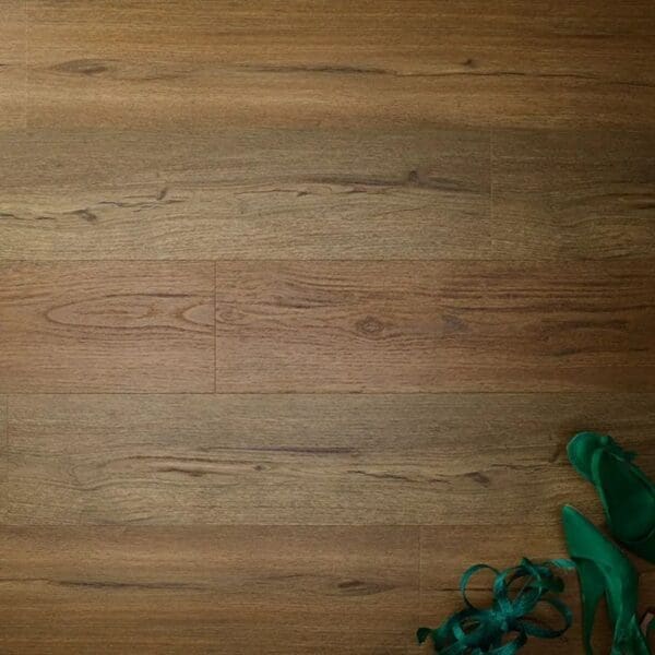 Textures aged oak plank flooring with green ribbon showing installed appearance