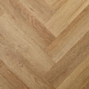 Textures summer oak herringbone flooring in warm golden brown tone