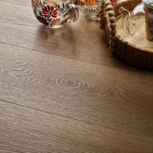 Textures summer oak plank flooring with decorative glass cups and woven basket