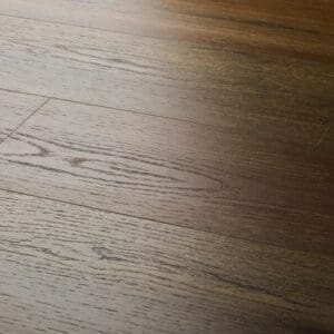 Close up view of textures aged oak plank showing detailed wood grain texture
