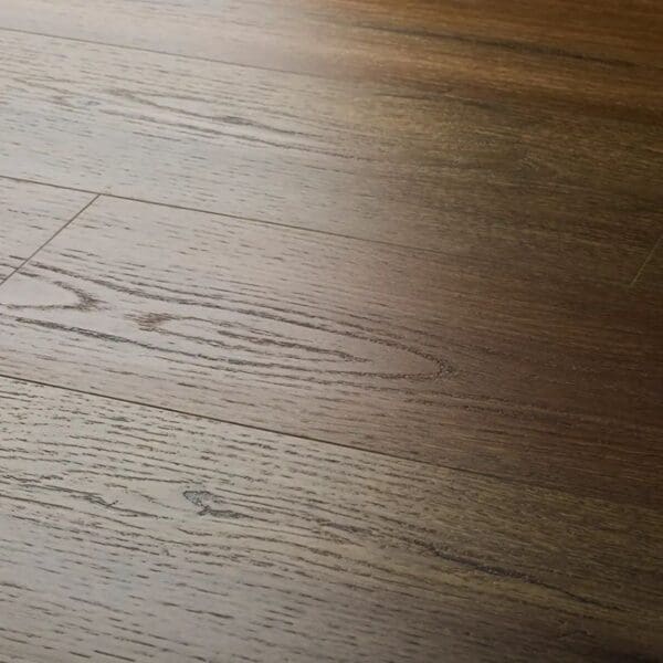 Close up view of textures aged oak plank showing detailed wood grain texture