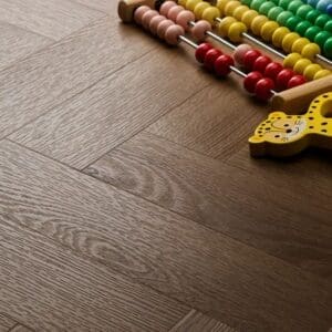 Textures cottage oak herringbone flooring with colorful wooden abacus toy