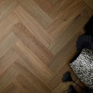 Textures aged oak herringbone flooring styled with decorative accessories