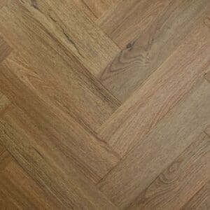 Textures aged oak herringbone luxury vinyl tile flooring in warm brown tones