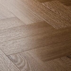 Close up view of textures cottage oak herringbone showing wood grain detail