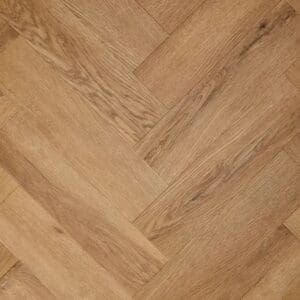 Textures traditional oak herringbone luxury vinyl tile flooring in warm golden brown
