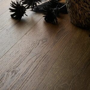 Textures aged oak plank flooring with decorative items showing installed appearance