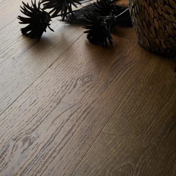 Textures aged oak plank flooring with decorative items showing installed appearance