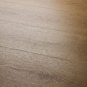 Close up of textures country oak plank showing detailed wood grain texture