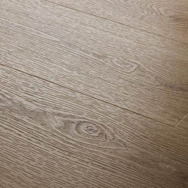 Close up view of textures light oak plank showing detailed grain pattern