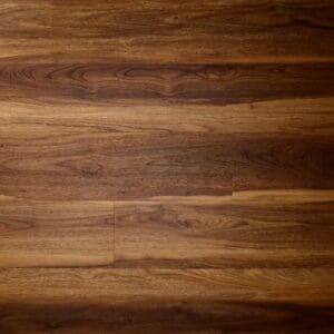 Textures warm walnut plank luxury vinyl tile flooring showing natural wood grain pattern