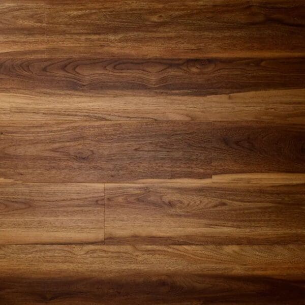 Textures warm walnut plank luxury vinyl tile flooring showing natural wood grain pattern