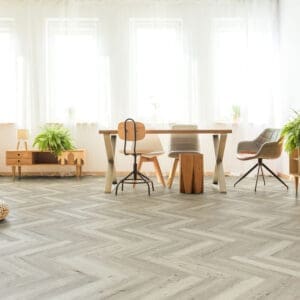 Bodo Herringbone SPC Light Washed Oak flooring - detail view showing texture and color