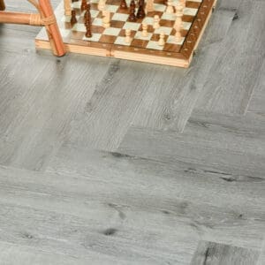 Bodo Herringbone SPC Winter Oak flooring - room shot showing texture and color