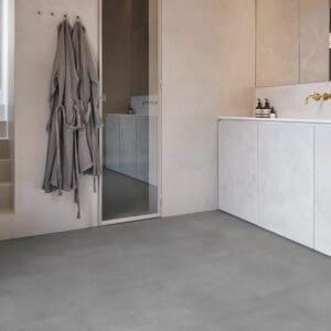 COREtec Essentials Tile Series Polished Concrete 95 flooring - room shot showing texture and color