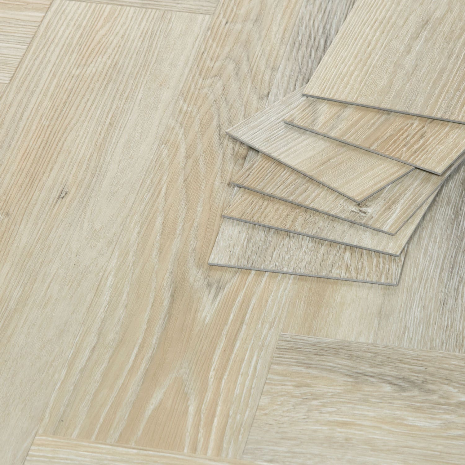 Tromso Herringbone LVT Limed Oak flooring - close-up showing texture and color