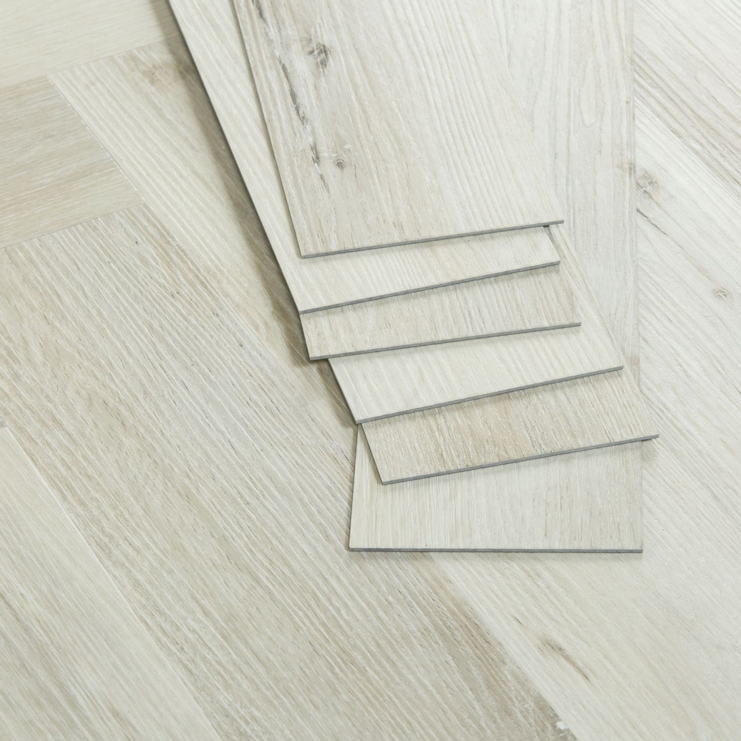 Tromso Herringbone LVT White Maple flooring - close-up showing texture and color
