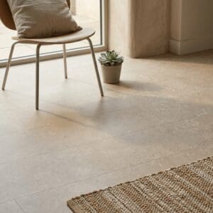 Amtico Spacia Agora Limestone luxury vinyl flooring detailed view - photorealistic room shot