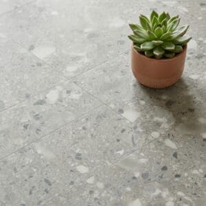 Amtico Spacia Piazza Caldera luxury vinyl flooring close-up texture - photorealistic room shot