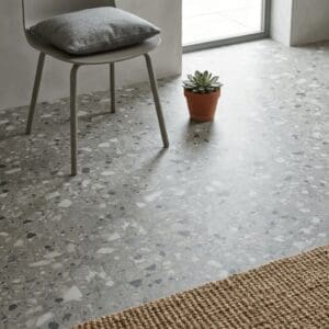 Amtico Spacia Piazza Caldera luxury vinyl flooring detailed view - photorealistic room shot