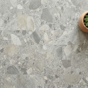 Amtico Spacia Piazza Montara luxury vinyl flooring close-up texture - photorealistic room shot