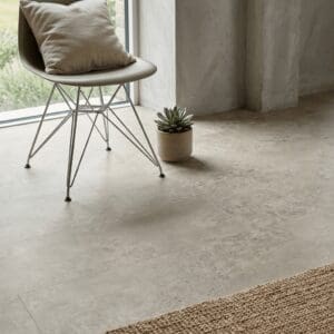 Amtico Spacia Portico Stone luxury vinyl flooring detailed view - photorealistic room shot