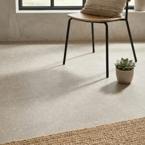Amtico Spacia Temple Stone luxury vinyl flooring detailed view - photorealistic room shot